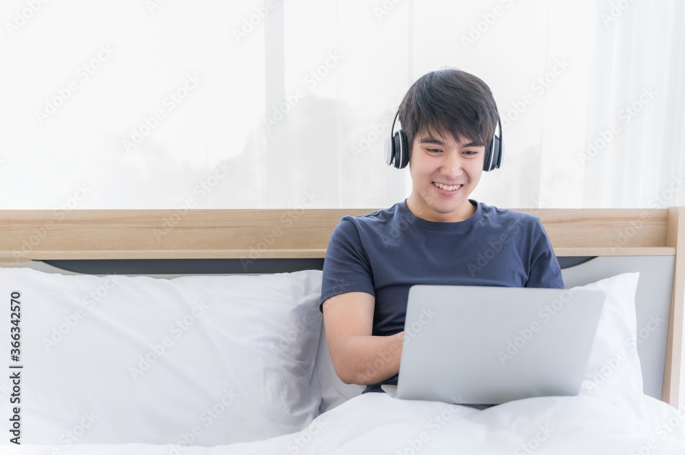 Happy asian businessman working from home. Happy asian businessman working from home.