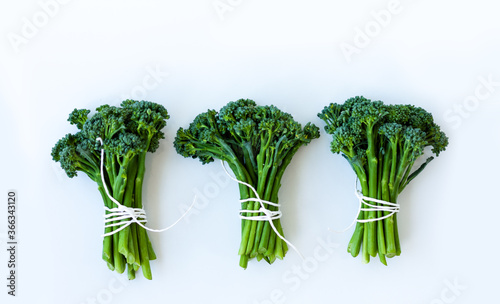 Fresh broccolini isolated on white background with copy space, vegetarian concept. photo