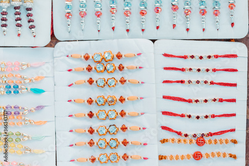 Directly above shot of various kinds of rakhi during the Raksha bandhan festival photo