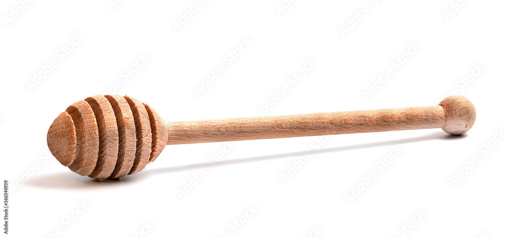 wooden spoon for honey on a white background wooden spoon for honey on a white background
