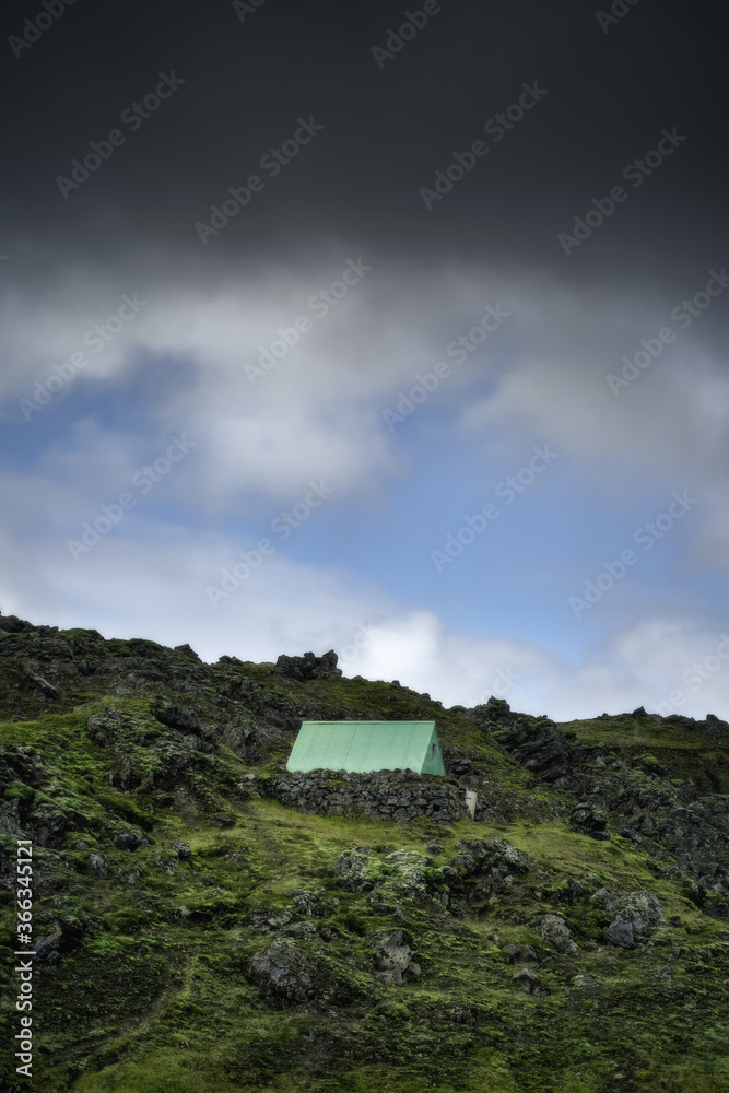 Iceland beautiful nature landscape in the day. House on the lava field with green moss
