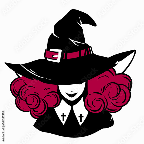 smiling young witch wearing typical witch hat