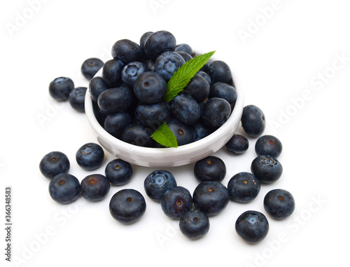 Blue berry in plate on white background 