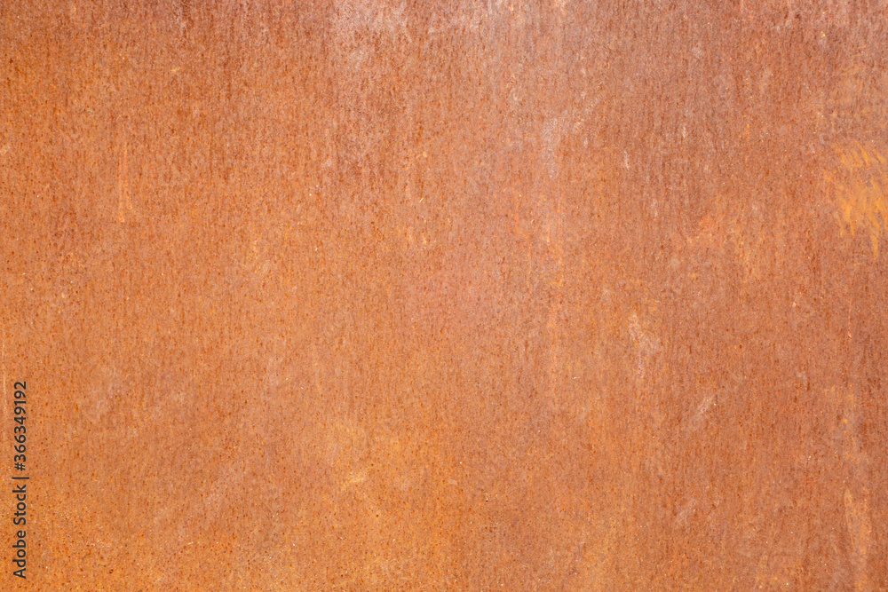 Photo of a rusty iron plate for use as a background. Photo of a rusty iron plate for use as a background.