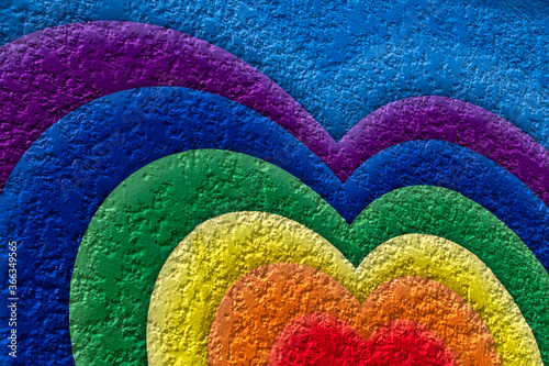 a rainbow of heart shapes