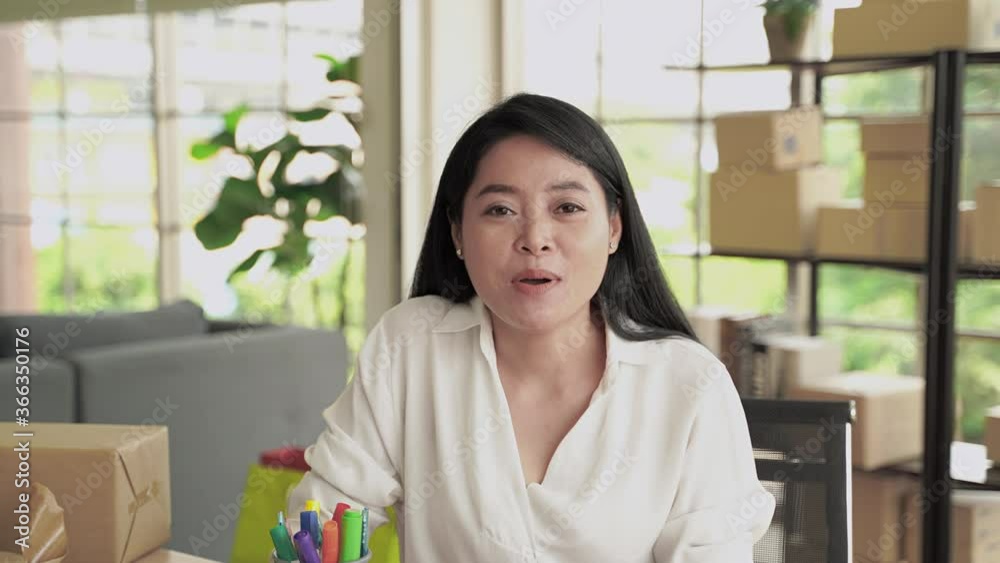 A middle-aged Asian woman is greeting through video calls, she is doing business online via social media.
A middle-aged Asian woman is greeting through video calls, she is doing business online via social media.