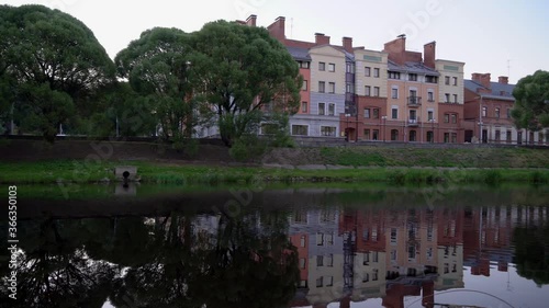 European city and river early summer morning