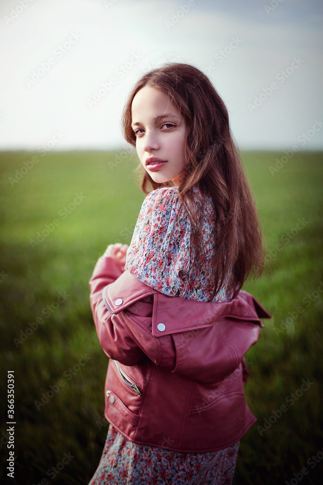 Portrait of a girl on the background of a field in spring
Portrait of a girl on the background of a field in spring