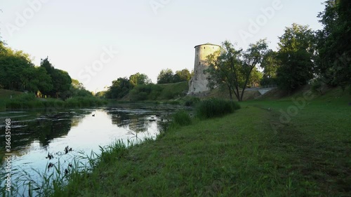 old tower by the river beautiful landscape