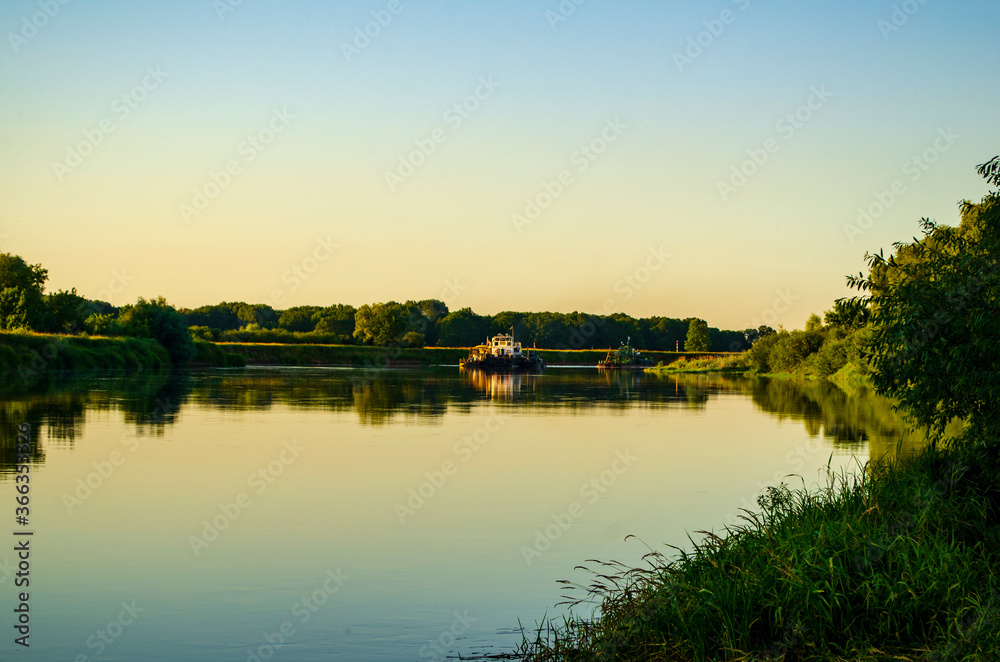 a barge floats on the Dnieper river a barge floats on the Dnieper river