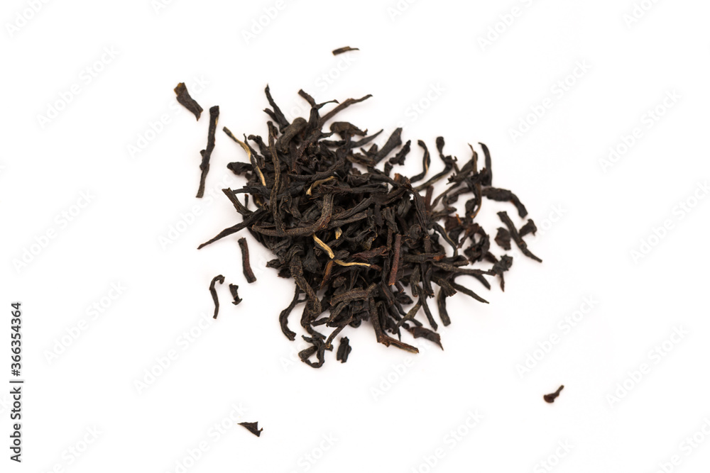 Fototapeta premium Leaves of black premium dry tea on a white background