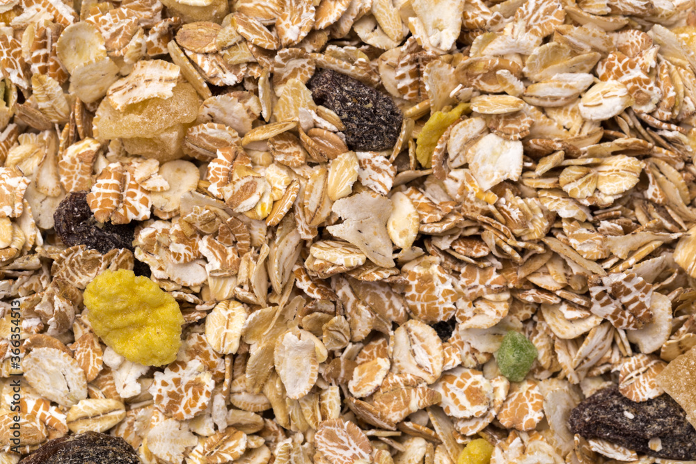 oatmeal with raisins, coconut, pineapple and banana slices isolated on a white background. For packing oatmeal or granola. oatmeal with raisins, coconut, pineapple and banana slices isolated on a white background. For packing oatmeal or granola.
