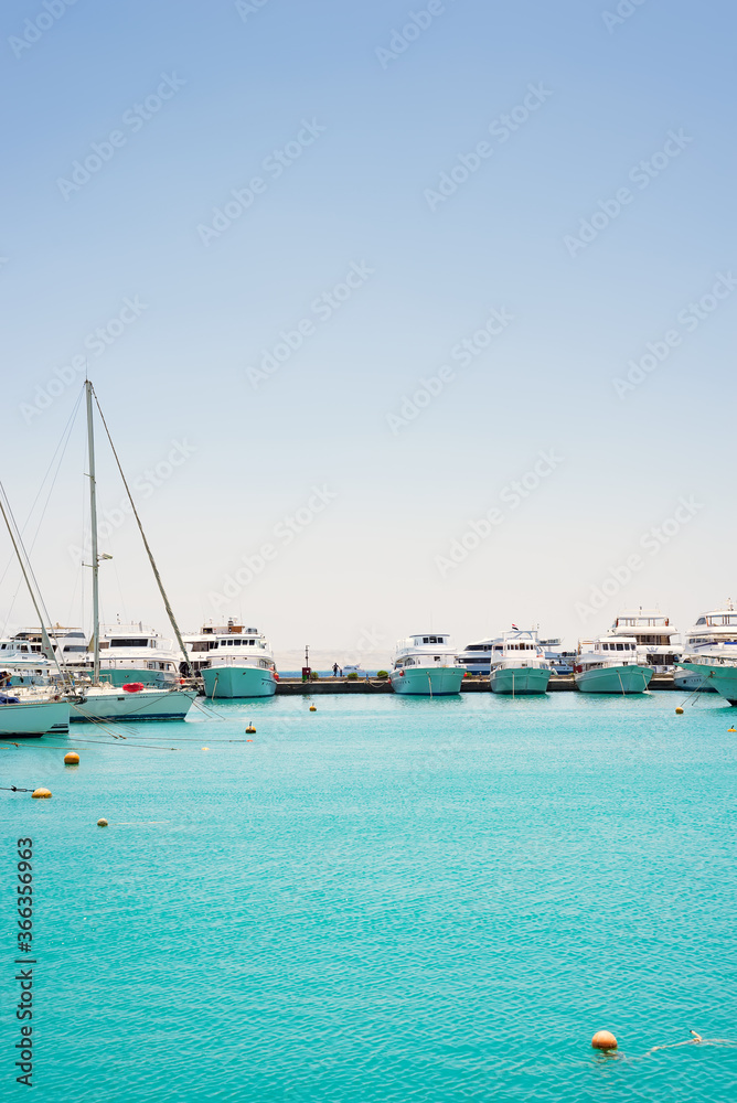 Seascape with parking and anchored boats and ships. Seascape with parking and anchored boats and ships.