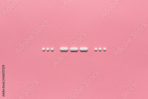 SOS morse code with medical drugs and pills photo
