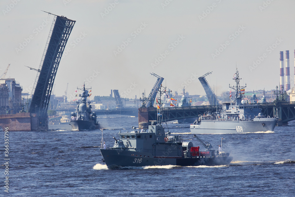 Obraz premium View of Russian Navy, modern russian military naval battleships warships in the row, northern fleet and baltic sea fleet, summer sunny day during the military exercise