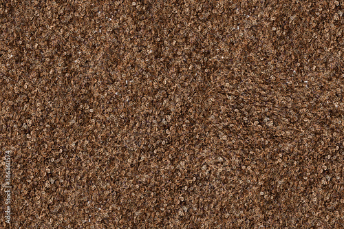 Spices and dill seeds are scattered throughout the image. Brown background