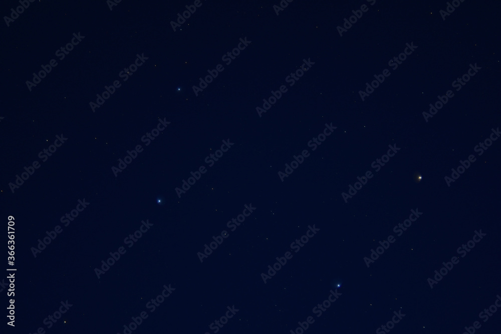 Starry sky in the village with noise in blue and black background