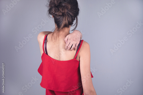 woman hand in ache back