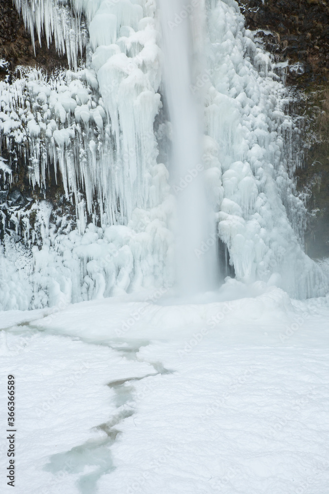 Horsetail falls following an ice storm in the Columbia River Gorge, east of Portland, Oregon