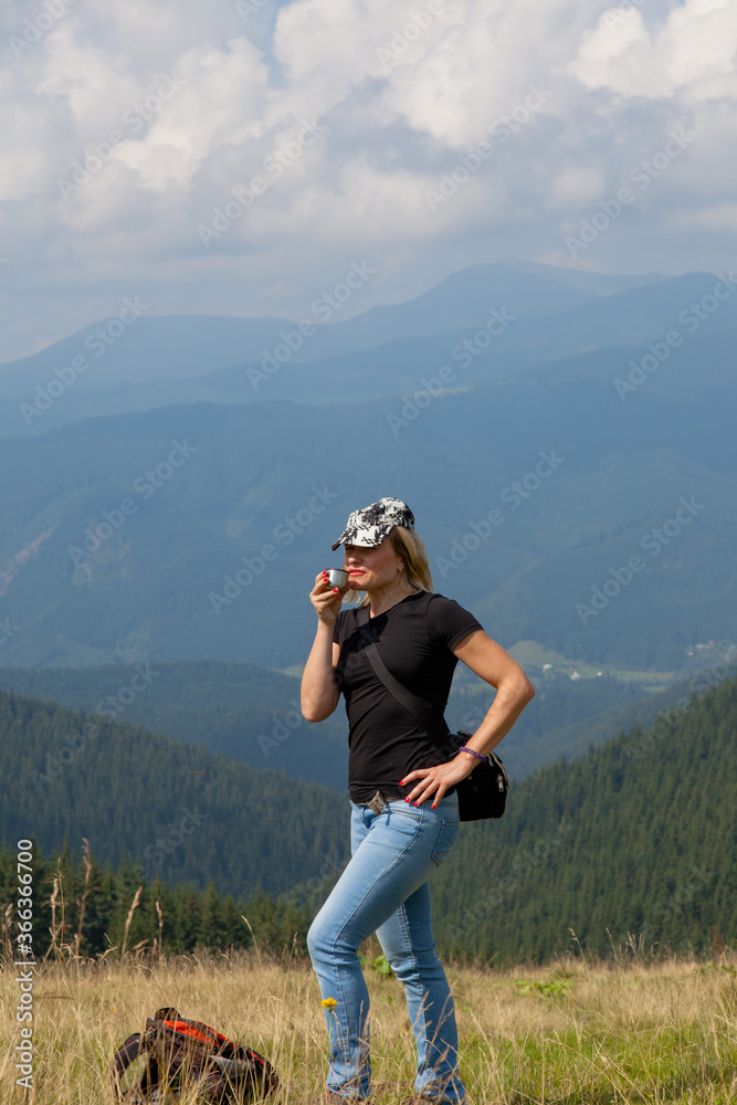 cheerful girl in the mountains