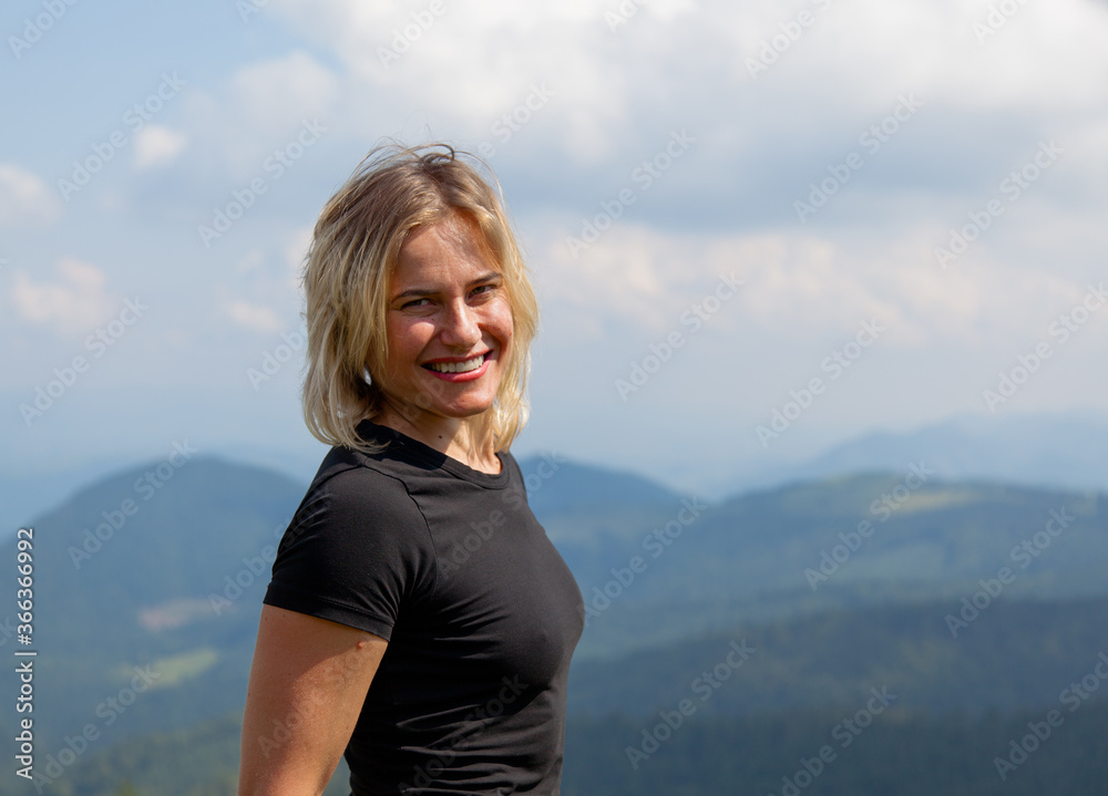 girl in a black t-shirt in the carpathians