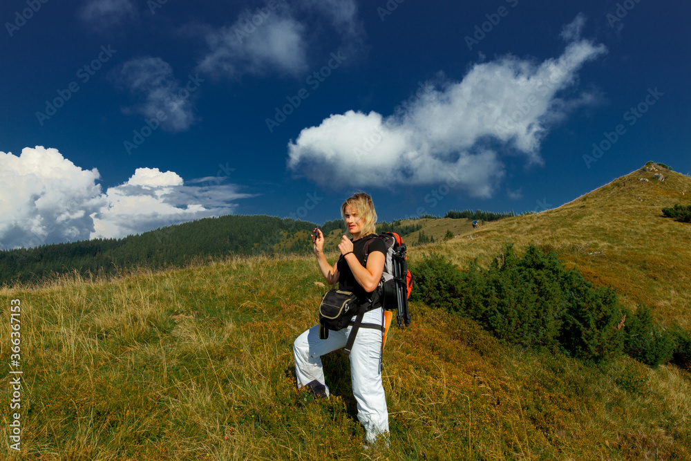 girl with smartphone in the carpathians