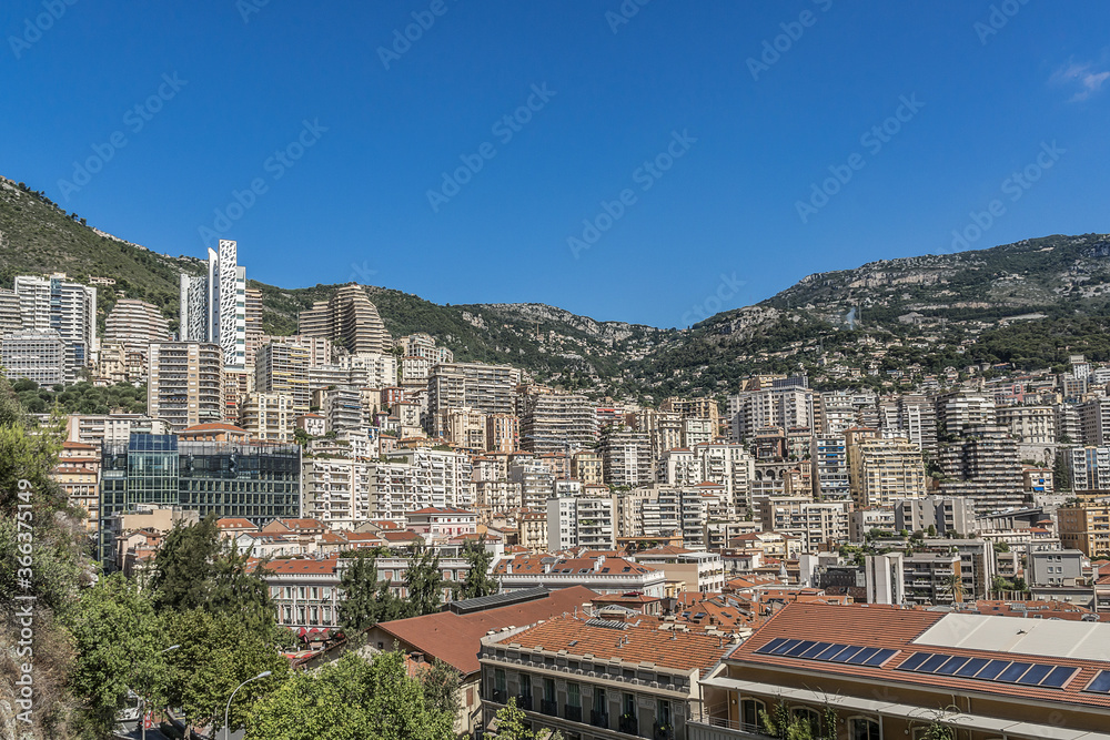 Naklejka premium Panoramic view on excellent residential buildings and marina in Monte Carlo, Monaco. Principality of Monaco is a sovereign city state, located on the French Riviera in Western Europe.