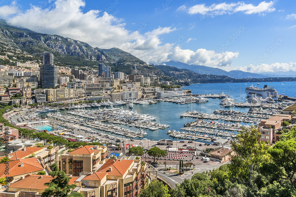Panoramic view on excellent residential buildings and marina in Monte Carlo, Monaco. Principality of Monaco is a sovereign city state, located on the French Riviera in Western Europe.