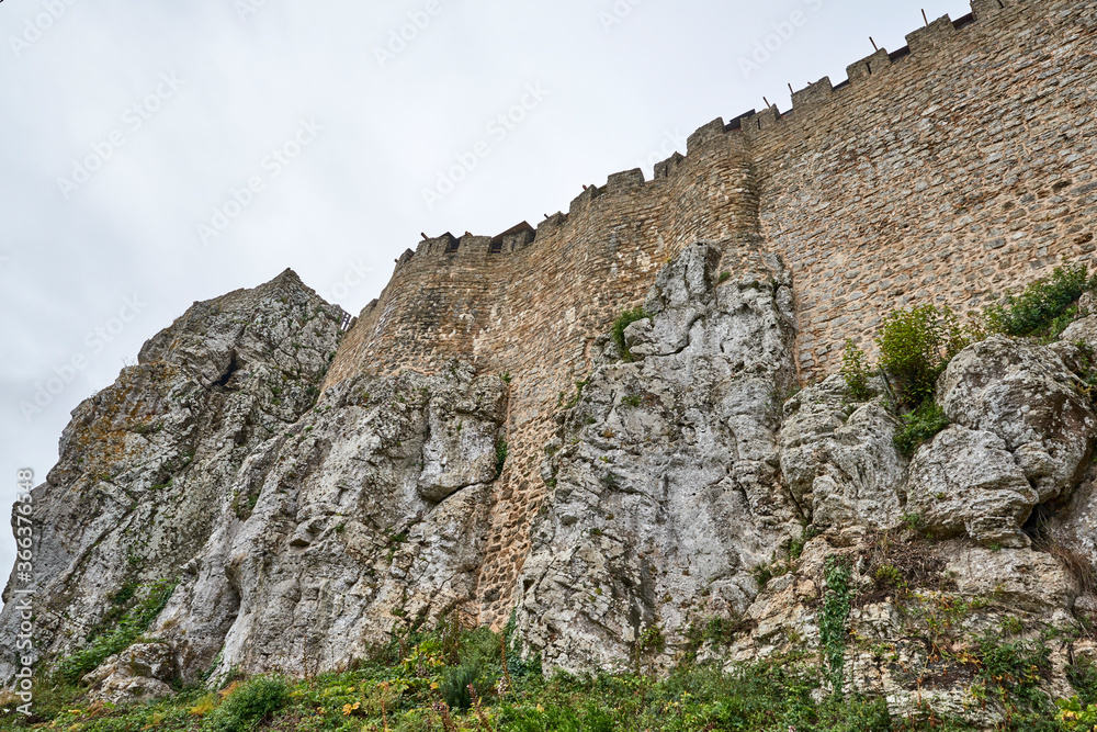 Portugal. The town of Obidos. Fortress walls have grown into rocks Portugal. The town of Obidos. Fortress walls have grown into rocks