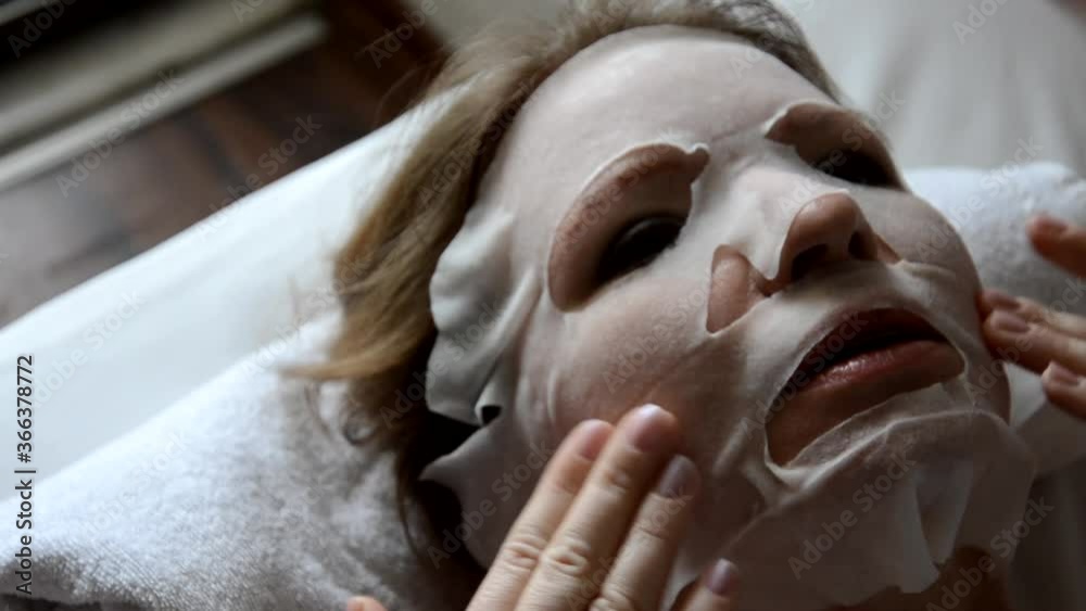 Young woman with clay facial mask. natural cosmetics, personal care, beautiful face, clean skin Young woman with clay facial mask. natural cosmetics, personal care, beautiful face, clean skin