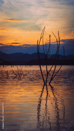 Concept  serenity and relaxation. Long exposure of sunrise over the lake and the mountains.