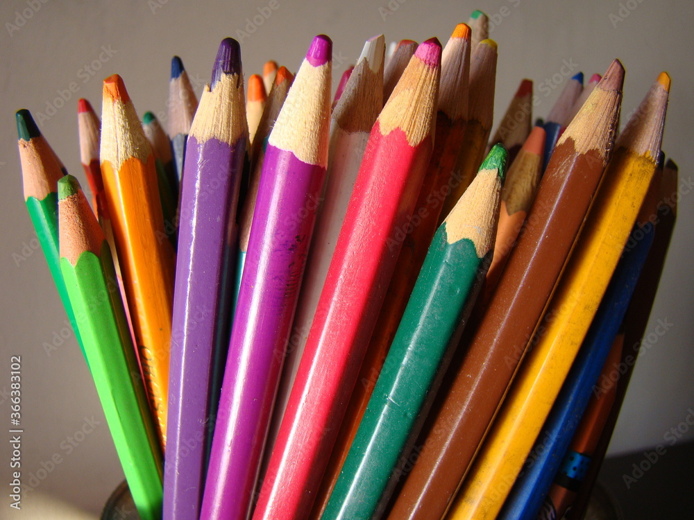 Fototapeta premium Colorful pens and pencils on a table