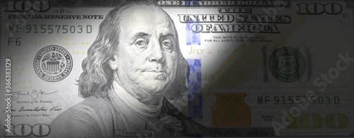 illiminated 100 dollar bills photo