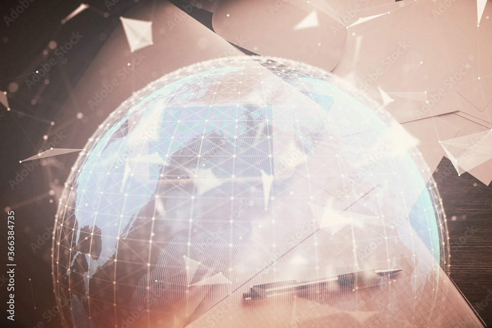 Double exposure of business theme hologram over desktop with phone. Top view. Mobile international trade connection concept. Double exposure of business theme hologram over desktop with phone. Top view. Mobile international trade connection concept.