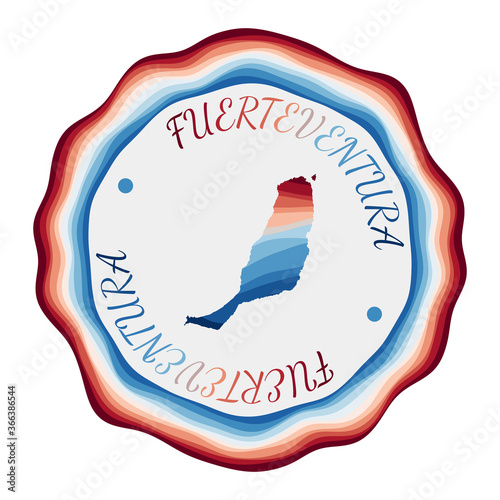 Fuerteventura badge. Map of the island with beautiful geometric waves and vibrant red blue frame. Vivid round Fuerteventura logo. Vector illustration.
