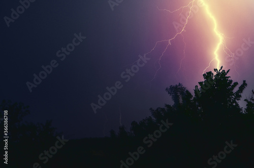 Thunderbolt in the night. Thunder Strike lightnings during a raging storm in a wild nature