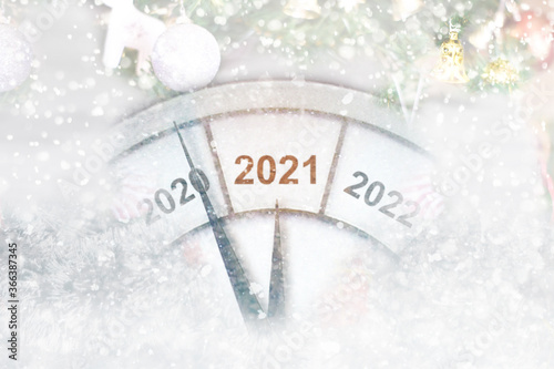 Countdown to midnight. Clock of holiday counting last moments before Christmas or New Year 2021.