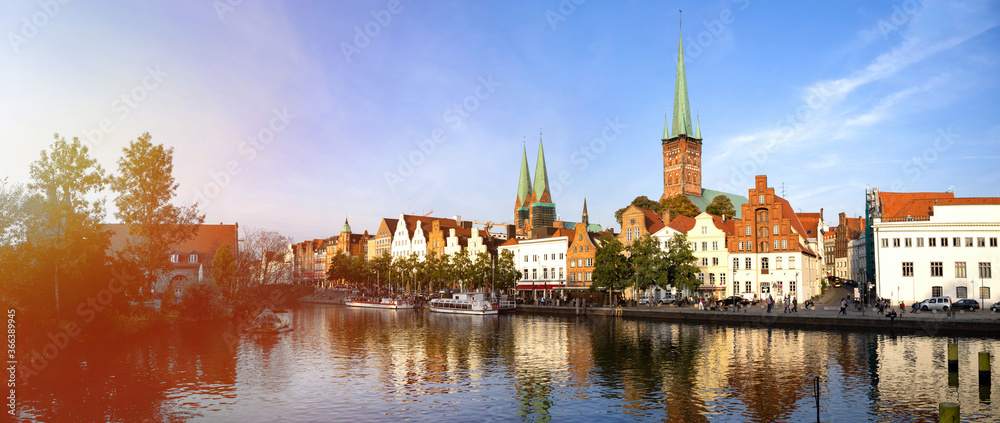 Skyline of the historic city of Luebeck with Trave river in summer, Schleswig-Holstein, Germany