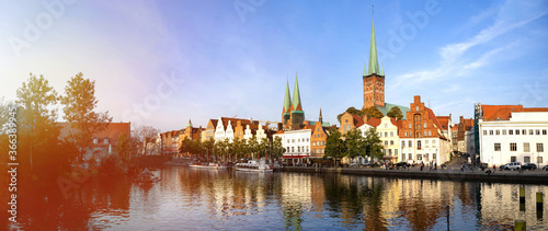 Skyline of the historic city of Luebeck with Trave river in summer, Schleswig-Holstein, Germany
