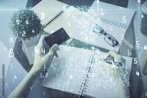 Double exposure of woman on-line shopping holding a credit card and data theme hologram drawing. E-commerce concept.