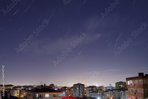 A view of the stars of the Milky Way with a mountain top in the foreground. Night sky nature summer landscape. Perseid Meteor Shower observation