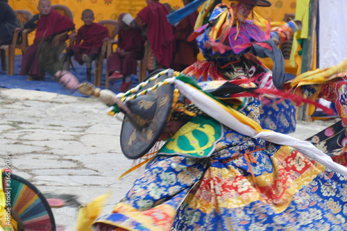 Blue skirt Black hat dancers Zhang cham   celebrate victory of good over evil photo