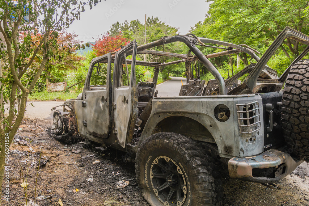 Fototapeta premium Automobile destroyed by fire