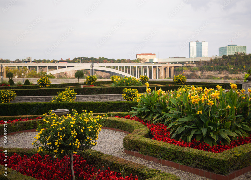 bridge in the distance and garden in the foreground on a cloudy day