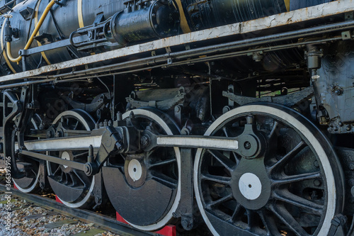 Wheels and push rods on locomotive.