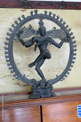 TANJORE, INDIA - DEC 29, 2019 - Shiva Nataraja lord of the dance, 12th century Vedaranyam Chola cast bronze, Bradishwara Temple, Tanjore, Thanjavur,  Tamil Nadu , India photo