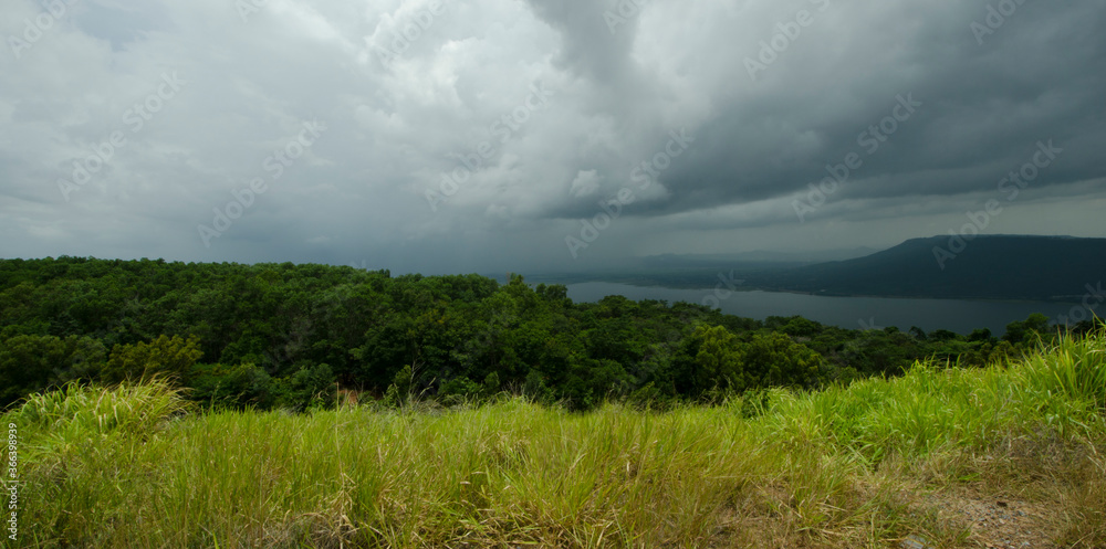 Beautiful lake and forest and rainy sky from highland view point