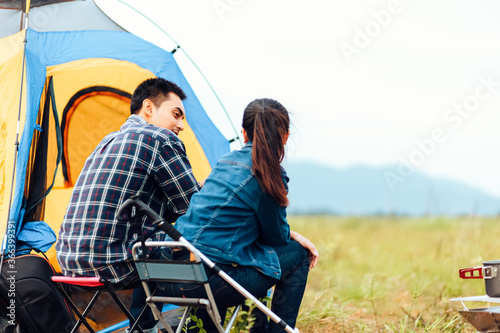 Couples drink coffee together during the morning camping.