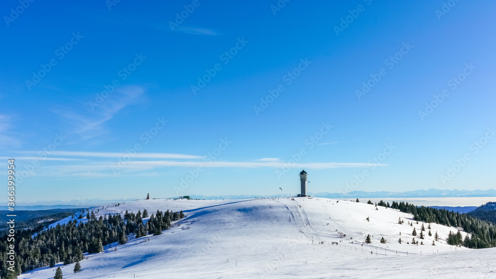 Winter Feldberg Ski Resort in Black Forest of German, tower at rear of treeless area