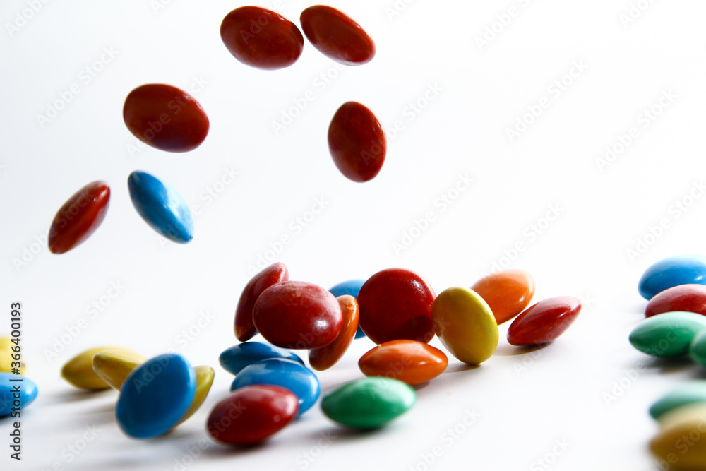 Colorful chocolate candy on white background